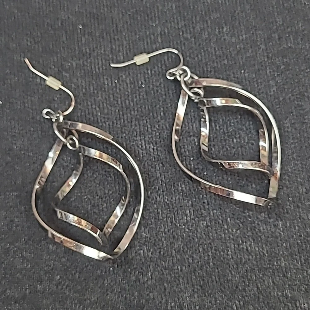 TWISTED SPIRAL PIERCED DANGLE EARRINGS